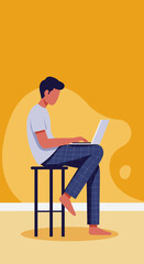 Young man working comfortably from home on his laptop, embodying remote work, online learning, or freelance productivity in a relaxed setting.