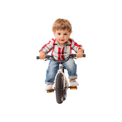A young boy riding a bicycle