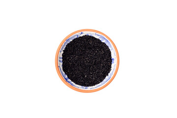 Kalonji Seeds in Clay Bowl on White bakground