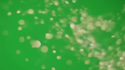 Abstract green background with shimmering light spots, creating a vibrant atmosphere for design use - Powered by Adobe