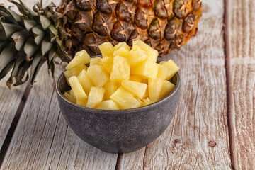 Sweet canned pineapple fruit pieces