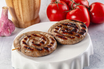 Grilled beef round circle sausages