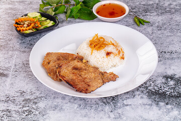 Roasted pork steak with rice