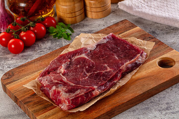Gourmet raw rib eye steak