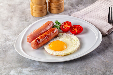 Breakfast with egg and sausages