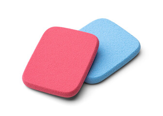 Bright makeup sponges on a white background. Makeup products. Makeup application tools.