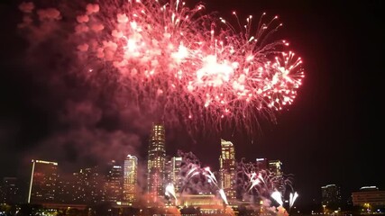 City Skyline Fireworks: Celebration over Urban Landscape