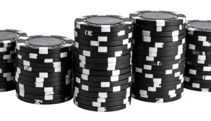Stacks of poker chips in black and white, ready for high-stakes casino games and gambling ventures