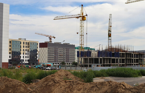 Modern apartment buildings under construction. New residential area. Urbanization. Ust-Kamenogorsk (kazakhstan)