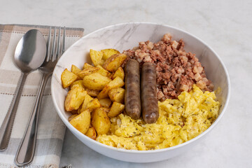 breakfast bowl with  corn beef hash  and home fries