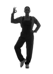 Silhouette of female worker showing OK on white background