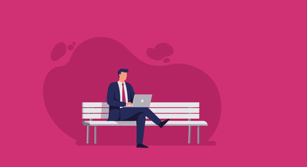 A professional businessman works remotely on his laptop while sitting on a bench, symbolizing modern productivity and flexible work arrangements.