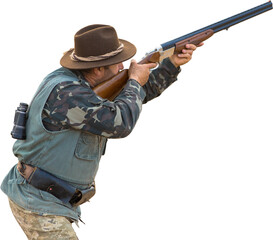 Mature hunter man holding a shotgun and walking through a field