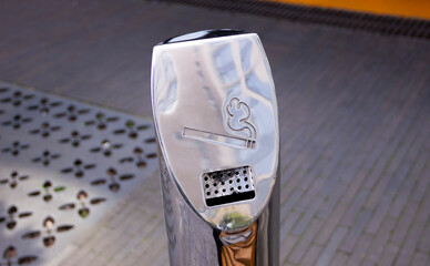 stainless steel ashtray in the city
