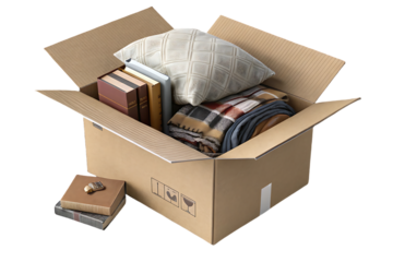 Moving box filled with books, cushions, blankets, and personal items packed for relocation purposes, isolated on a transparent background