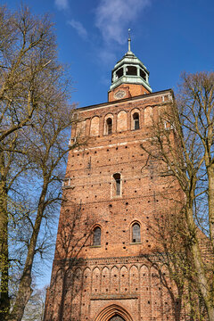 Brick bell tower of a Gothic church in Osno