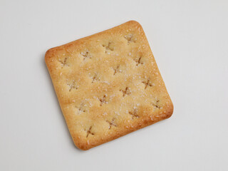 Crispy crackers on white background