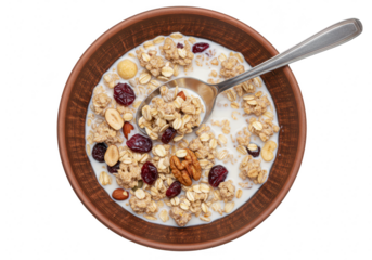 A bowl of healthy cereal with milk, fruit, nuts, and a spoon, isolated on transparent background