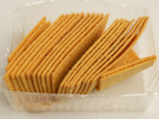 Crispy crackers on white background