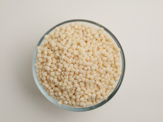White rice puffs on white background