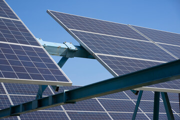 Solar panels generate electricity at solar farm.