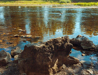 Clear river water and rocks