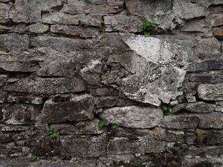 Background of very old stone wall texture photo