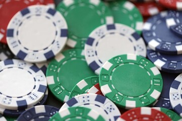Poker Table With Poker Chips Turns In Casino. Many Poker Chips Spins on the Table