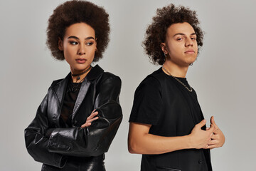 Stylish duo captures the essence of modern fashion with timeless charm and flair