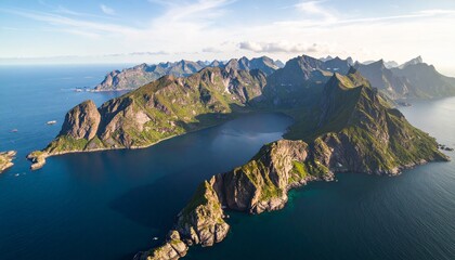 Majestic aerial view of a rugged, mountainous coastline with a calm, deep blue bay, showcasing dramatic cliffs and green, sparse vegetation under a bright, clear sky.