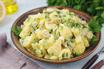 A bowl with Greek potato salads