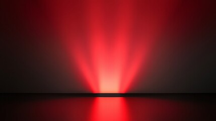 Vivid red light beams illuminating a dark  space.