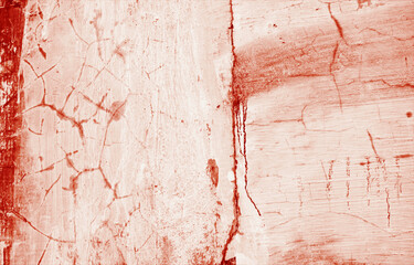 Weathered wall with cracked plaster in reddish tones. Perfect for background textures, rustic interiors, design projects, or vintage aesthetics.