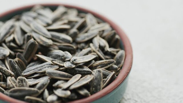 sunflower seeds in a bowl close up	