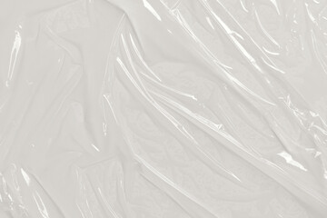 Close up shot of a wrinkled plastic sheet. Suitable for backgrounds, textures, or environmental themes in design projects.