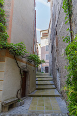 Fototapeta premium Narrow street in Entrevaux medieval village, Provence, France