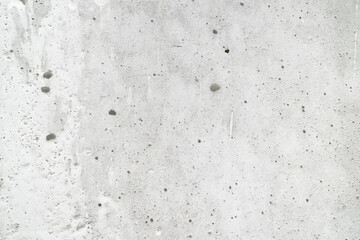 Closeup of light gray concrete texture, suitable for construction industry or background design in architectural projects. Versatile texture for various design needs.