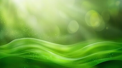 Fototapeta premium Green flowing fabric with soft light background.