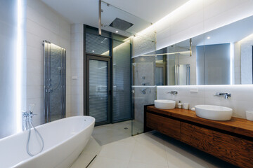 Discover modern bathroom design with elegant fixtures and innovative lighting options