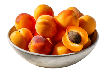 Ripe, juicy apricots in a bowl. Healthy fruit, summer harvest.