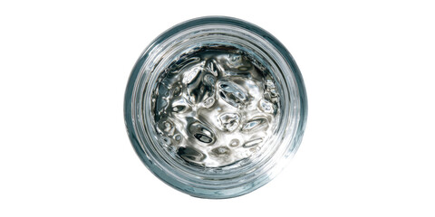 Close-up of water with ice in a round glass