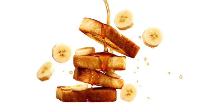 Stack of banana slices on syrup-soaked pancakes, creating a delicious and tempting breakfast display.