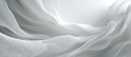 Obraz premium Draped white fabric with soft folds and gentle curves