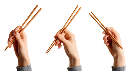 Three hands holding wooden chopsticks