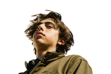 Young person in olive jacket looking upward with tousled brown hair and contemplative expression, isolated on a transparent background