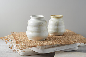 homemade vases on gray background