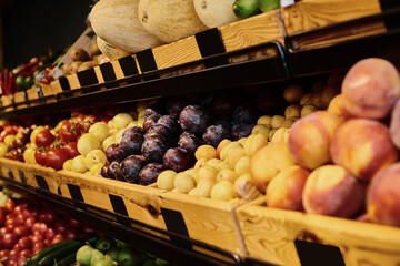 Supports local farmers by shopping for organic produce at grocery store
