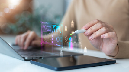 Close-up hand using a digital pen for an AI recruitment system with a futuristic interface on a virtual screen. HR technology concept in modern business.
