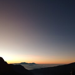 Sunrise over the mountains at Bromo . Malang Regency, East Java, Indonesia, Asia