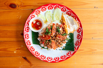 Thai food called Pad Basil with pork, basil leaves and chilli